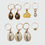 Thumbnail: Gold Metallic Conch Shell Rings