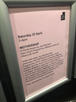 A notice on pink paper in a small frame, in an elevator at The New Art Gallery Walsall.
The text reads: