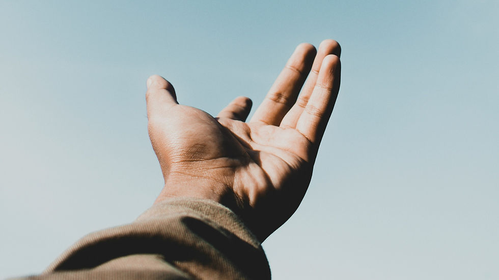 hand reaching for sky