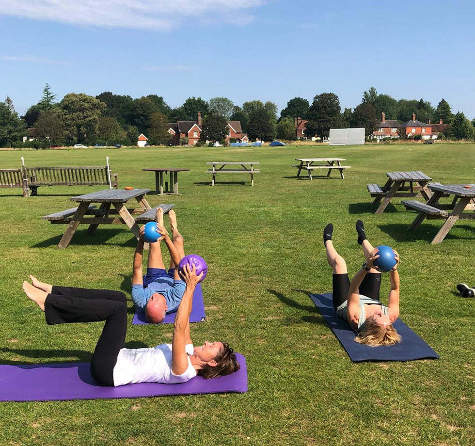 Wide angle view of a supportive community in a fitness studio