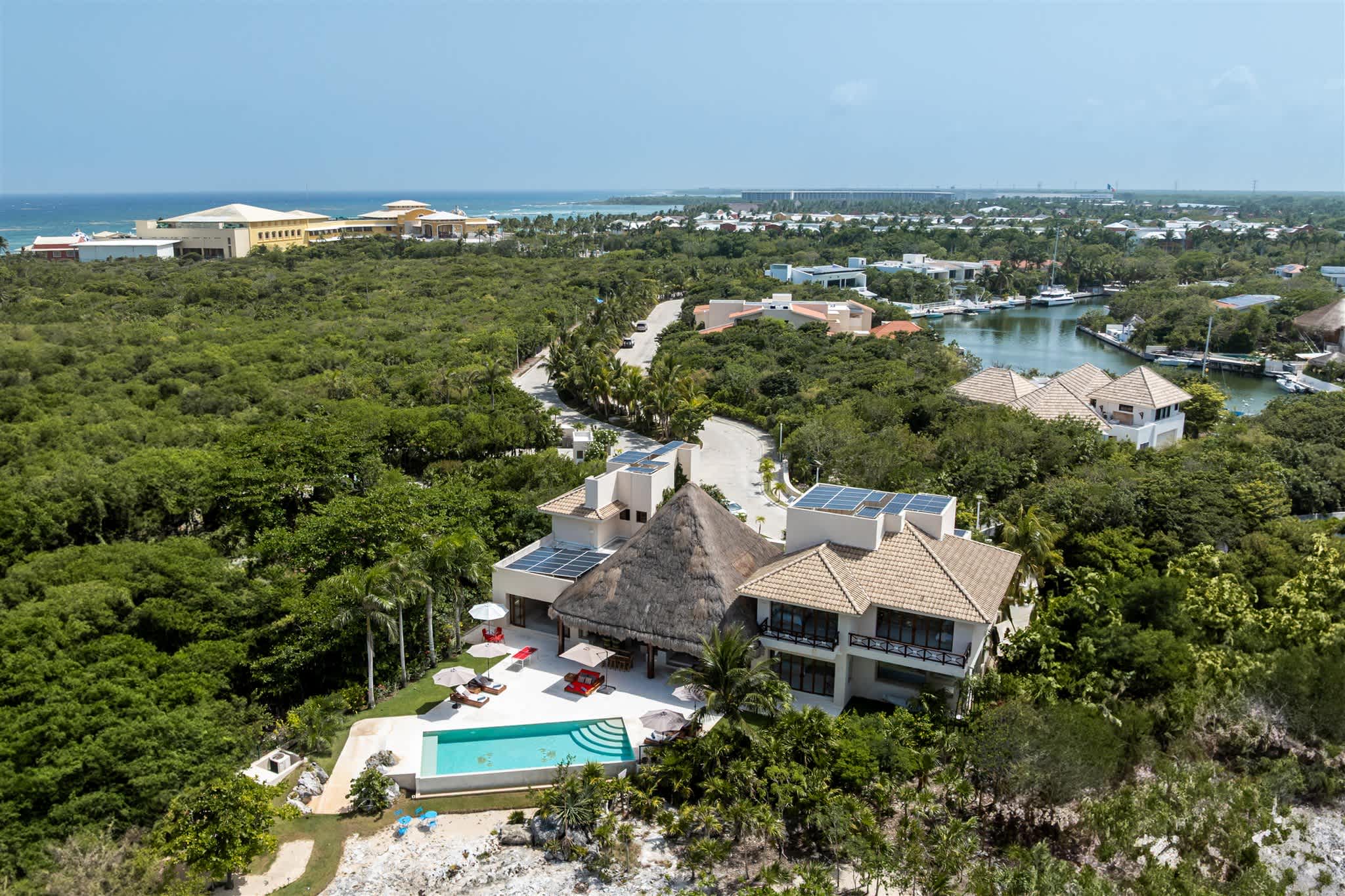Casa Cangrejo Feliz seen from above, on the water with its private pool