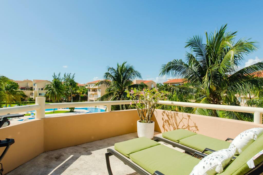 Beach and gardens of the condominium