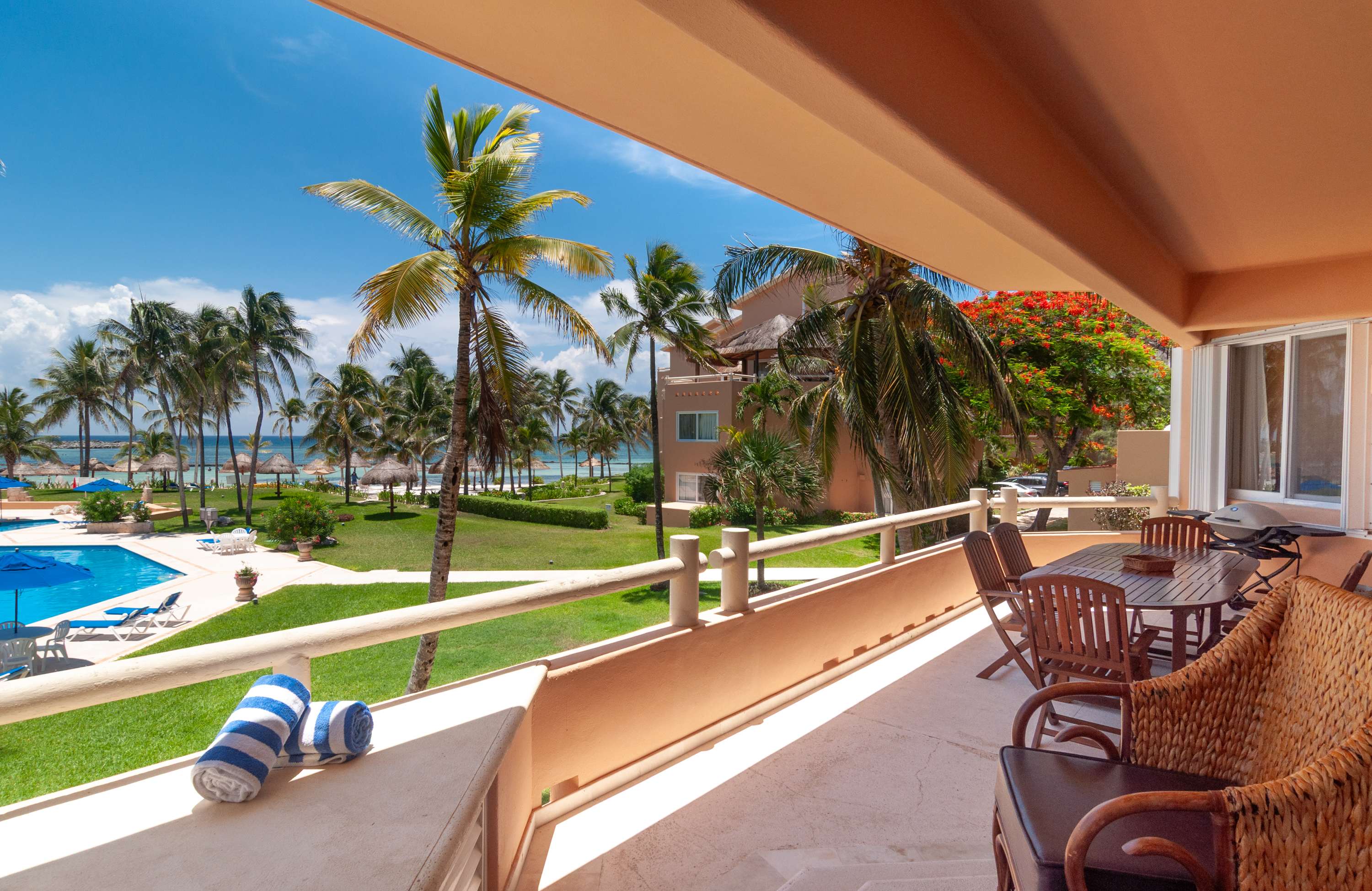 Terrace overlooking the pool, the gardens and the sea