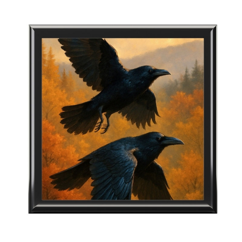 Jewelry box featuring artwork of two ravens flying against a warm sky