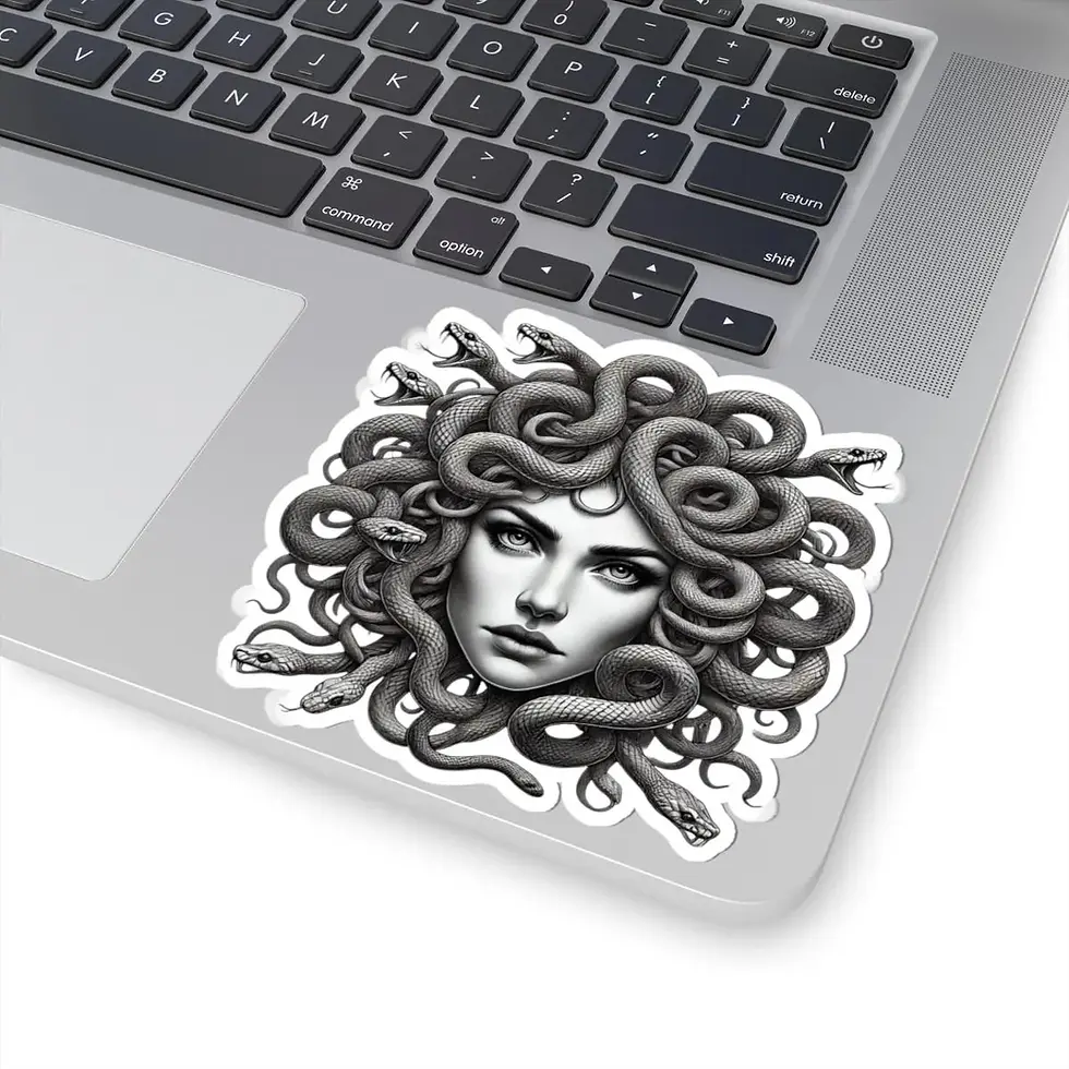 Medusa vinyl sticker with bold black linework, detailed snakes, and a fierce gaze on a white background.