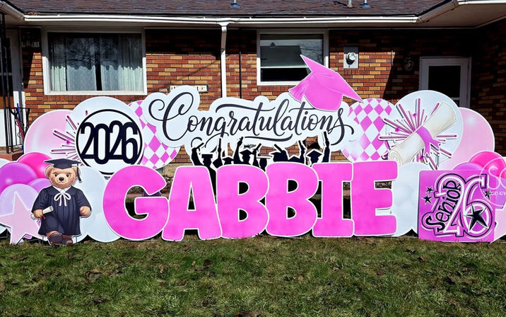 Senior graduation yard sign with photo and school colors