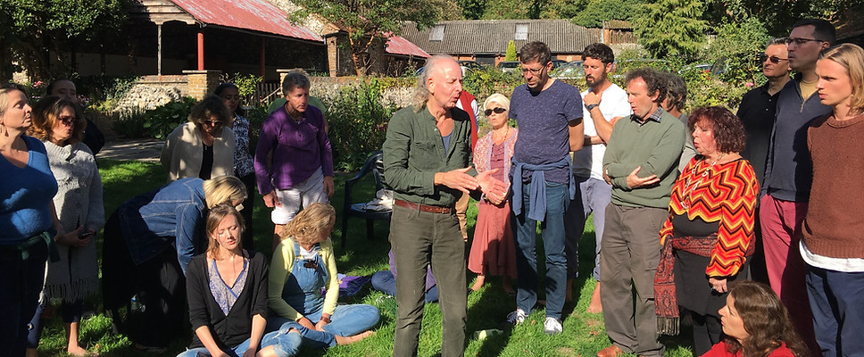 John Bowker leading a harmony sinigng workshop in the grounds of Loudwater Farm, Rickmansworth.