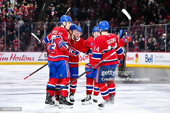 MONTREAL, CANADA - APRIL 07: Ivan Demidov #93 of the Montréal Canadiens celebrates his goal with teammates Juraj Slafkovský #20, Lane Hutson #48, Cole Caufield #13 and Nick Suzuki #14 during the second period against the Florida Panthers at the Bell Centre on April 7, 2026 in Montreal, Quebec, Canada. (Photo by Minas Panagiotakis/Getty Images)