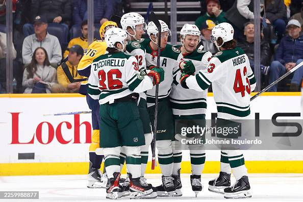 NASHVILLE, TENNESSEE - FEBRUARY 04: Mats Zuccarello #36, Quinn Hughes #43, Joel Eriksson Ek #14, Matt Boldy #12 and Kirill Kaprizov #97 of the Minnesota Wild celebrate after a goal against the Nashville Predators during the first period of the game at Bridgestone Arena on February 04, 2026 in Nashville, Tennessee. (Photo by Johnnie Izquierdo/Getty Images)