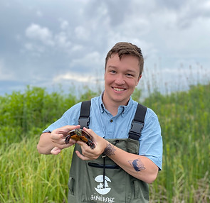 Dartagnan Mullins with painted turtle Pushaw Lake 6-13-2022.jpg