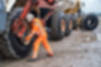 Tyre Technician fitting earthmover tyre