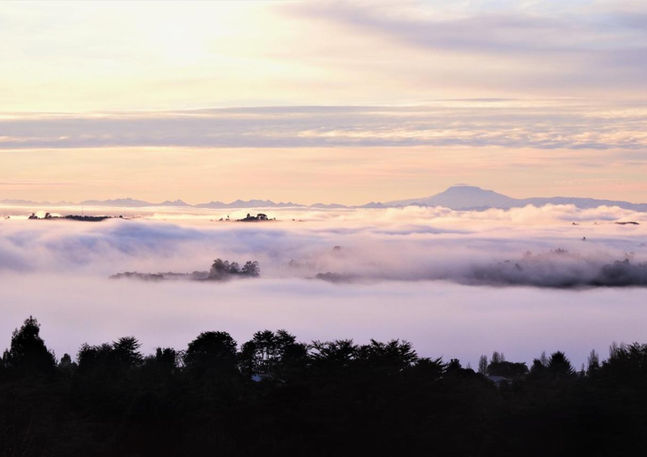 Sunrise with a panoramic view of the Andes Mountains in Parque Tronadores on Chiloe