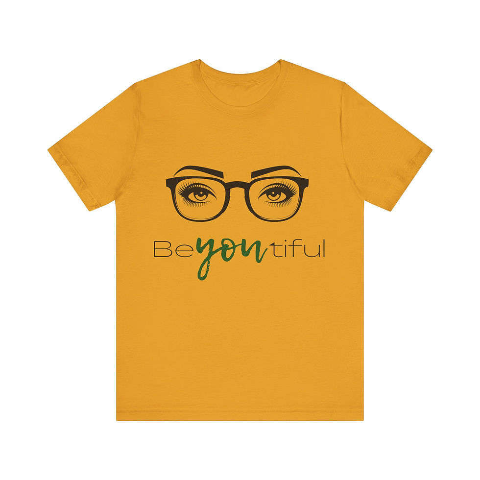 BeYOUtiful Tee:  mustard tee with eyelashes and glasses graphic