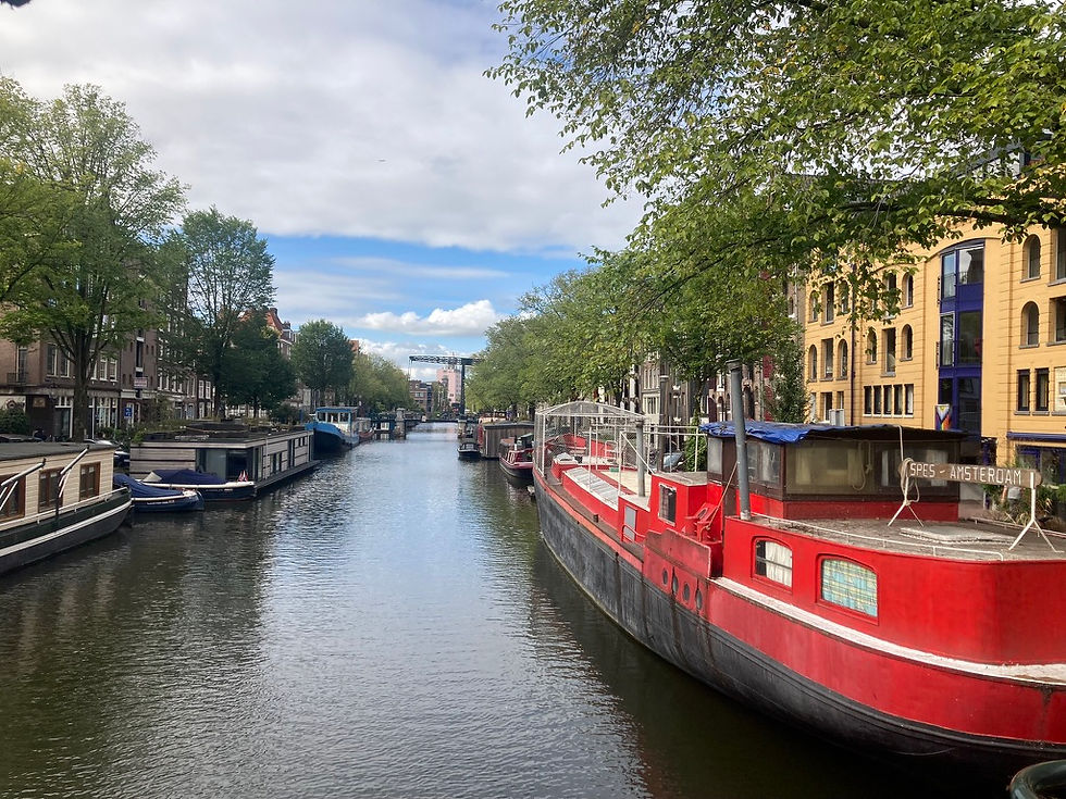 Many houseboats line the canals in Amsterdam