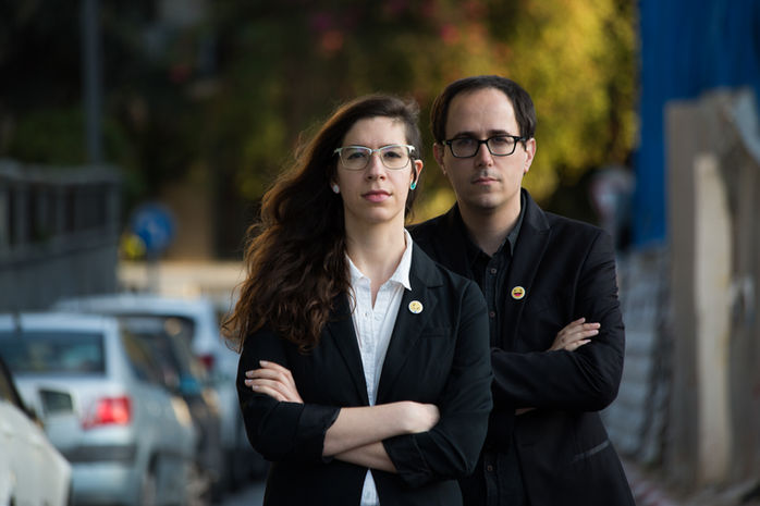 Dafna Talmon portraits: Man and woman standing outdoors