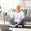home-training-smiling-senior-woman-excercising-dumbbells-front-laptop-watching-online-tuto