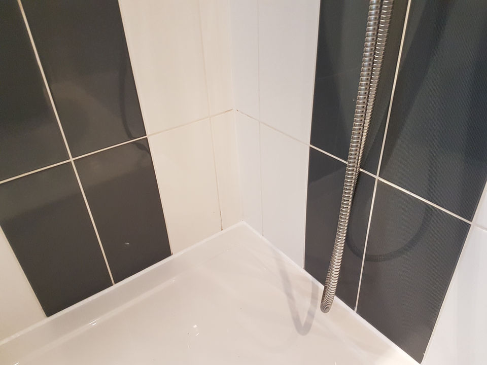 Shower showing new silicone.