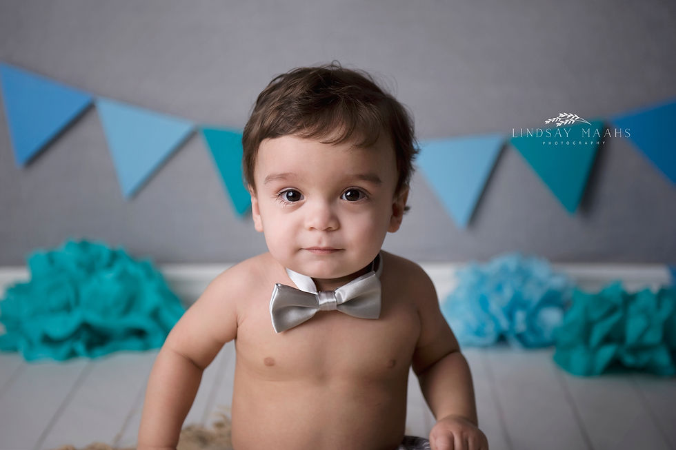 Ottawa cake smash portrait boy close up