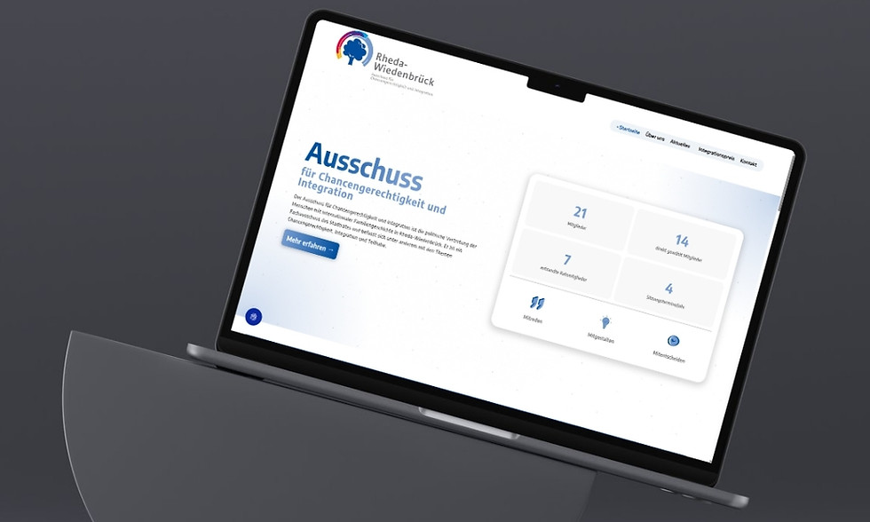 Laptop-Ansicht der Website für den Ausschuss für Chancengerechtigkeit Rheda-Wiedenbrück, entwickelt als skalierbare CMS-Lösung durch die Webdesign Agentur Kalena Designs.