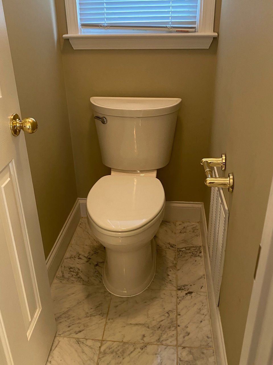 Toilet installed in bathroom in home