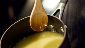 Pot with melted butter, representing a recipe for ghee
