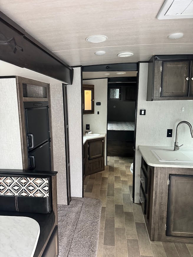 2019 Heartland Mallard interior: kitchen, dining, hallway