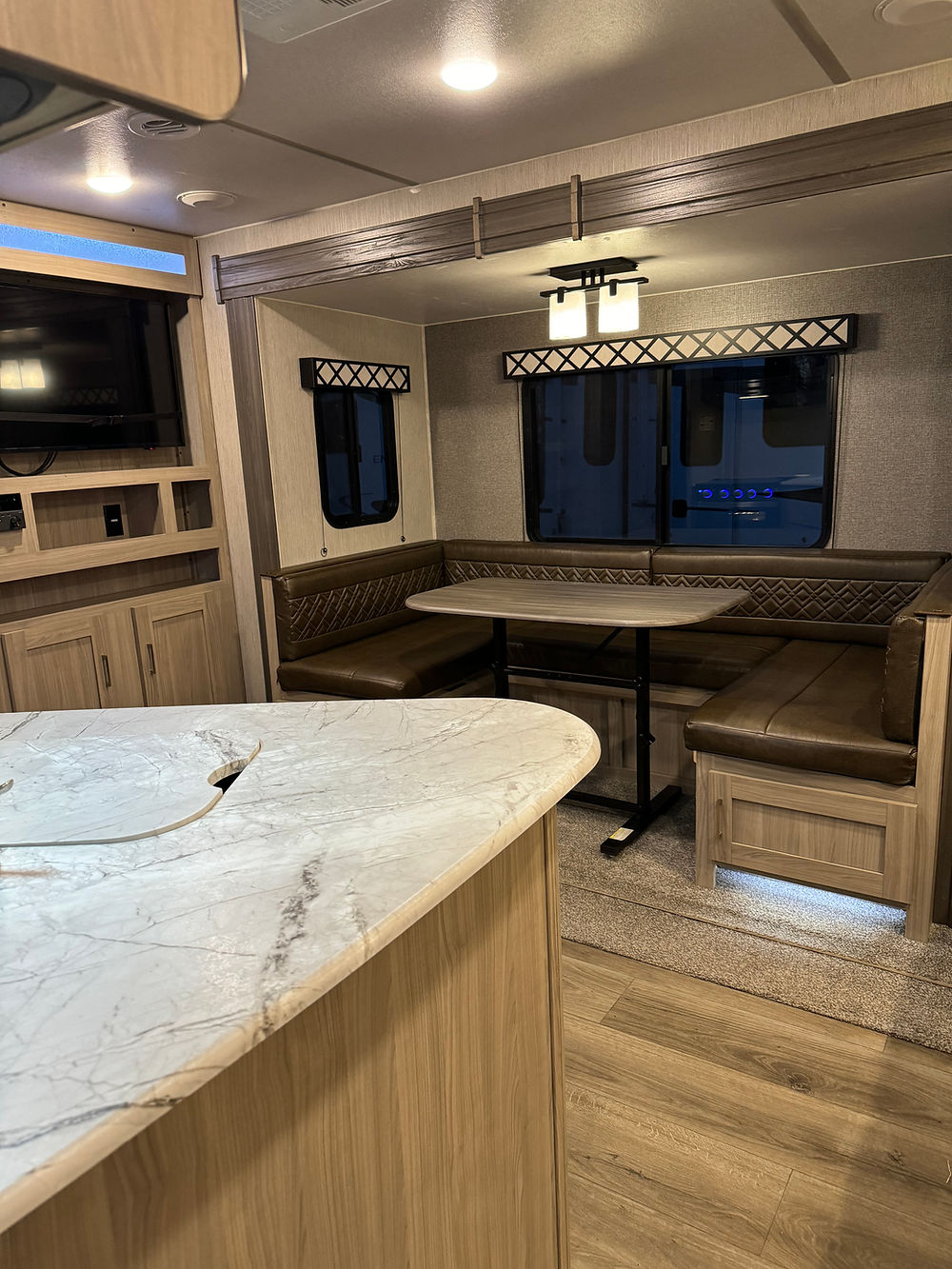 Interior of a 2020 Coachman Freedom Express with kitchen and dinette