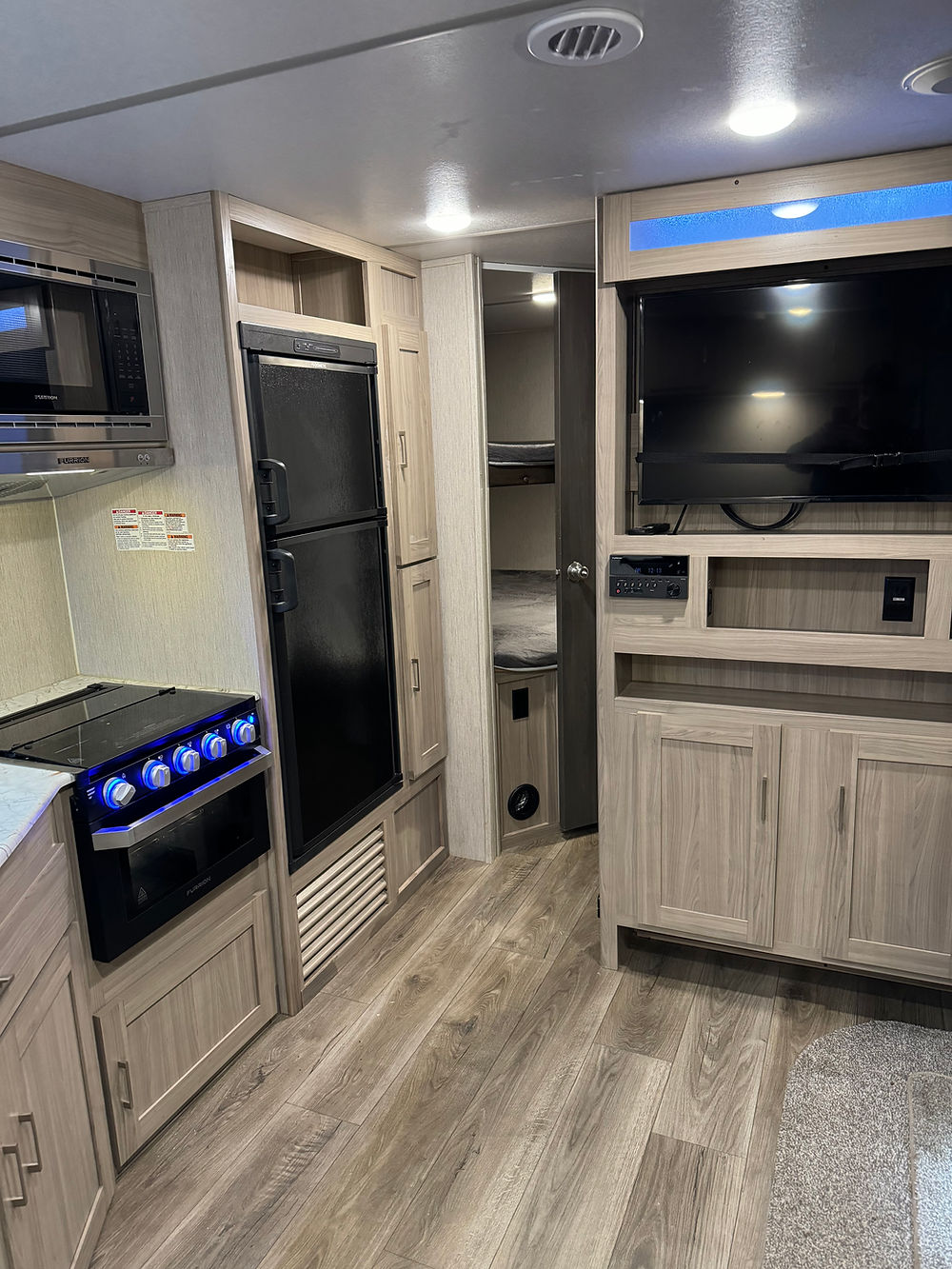 Interior of the 2020 Coachman Freedom Express RV kitchen and living area