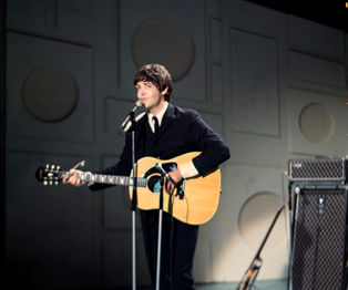 Beatles - Paul Performing Yesterday by Howard Grafton JM Art Management
