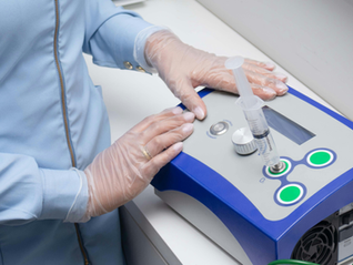 A Scientist with a Medical Device