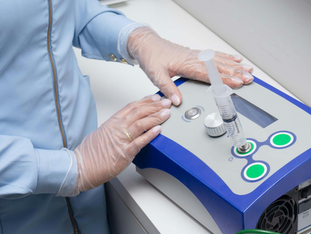 A Scientist with a Medical Device