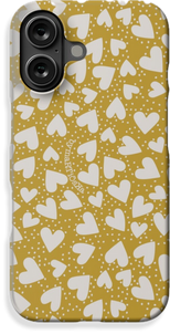 Étui iPhone avec motif de cœurs crème stylisés et pois sur fond jeune — design mignon et élégant.