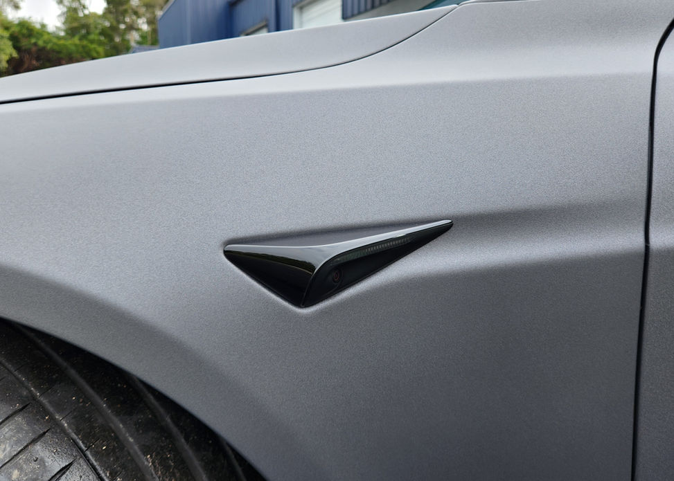 Elegant Tesla Model S showcasing Satin Stealth Gray wrap, crafted by specialists in Sarasota, FL