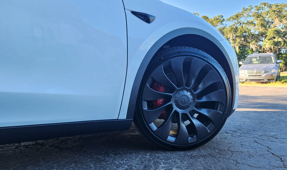 Close-up of Tesla Model Y Performance window with Nano Ceramic Heat-Rejecting Tints, adding elegance and functionality."
Title:
"Sarasota Drive: Tesla Model Y Performance with Advanced Nano Ceramic Tints"
Description:
"Enjoy a smooth and comfortable drive in Sarasota with our Tesla Model Y Performance featuring state-of-the-art Nano Ceramic Heat-Rejecting Window Tints."
Alt Text:
"Tesla Model Y Performance cruising Sarasota streets with advanced Nano Ceramic Heat-Rejecting Window Tints."
Title:
"Heat Blocker: Nano Ceramic Tints on Tesla Model Y Performance in Sarasota"
Description:
"Conquer the Florida heat with our Nano Ceramic Heat-Rejecting Window Tints on the Tesla Model Y Performance. Drive in style, stay cool."
Alt Text:
"Tesla Model Y Performance parked with Nano Ceramic Heat-Rejecting Window Tints, blocking out the heat in Sarasota."
Title:
"Performance, Style, Protection: Tesla Model Y in Sarasota with Nano Ceramic Tints"
Description:
"Unleash the full potential of your Tesla Model Y Performance in Sarasota, complemented by Nano Ceramic Heat-Rejecting Window Tints. Performance, style, and protection combined."
Alt Text:
"Tesla Model Y Performance showcasing the perfect blend of performance and protection with Nano Ceramic Heat-Rejecting Window Tints in Sarasota."


Close-up of Tesla Model Y Performance window with Nano Ceramic Heat-Rejecting Tints, adding elegance and functionality.
