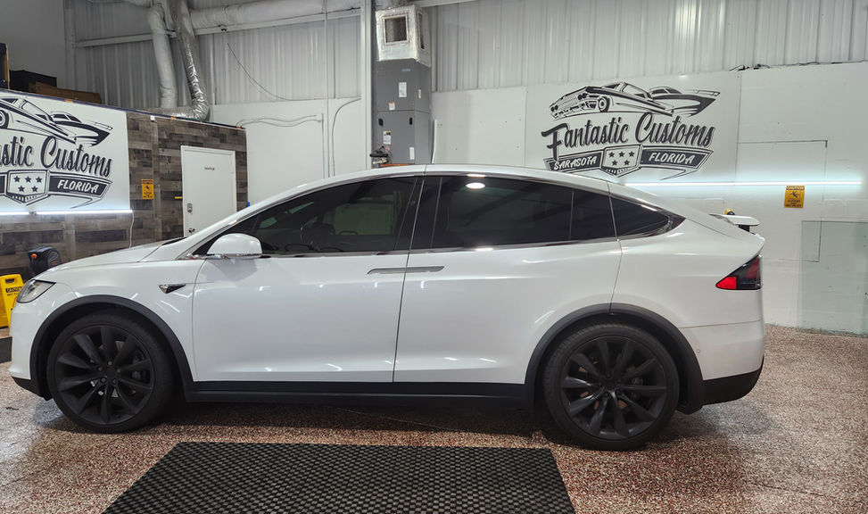 Tesla Model X Performance parked in Sarasota featuring advanced Nano Ceramic Heat-Rejecting Window Tints.