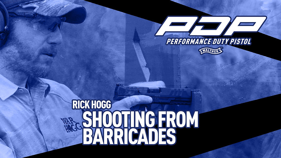 Rick Hogg founder War HOGG Tactical instructing on shooting from barricades with a Walther PDP pistol and Aimpoint ACRO