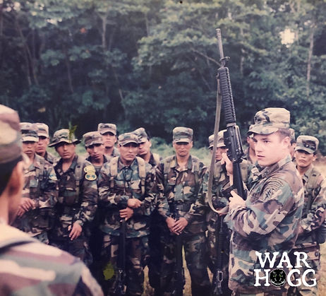 Rick Hogg teaching rifle marksmanship while in 7th Special Forces Group Foreign Internal Defense (FID) mission