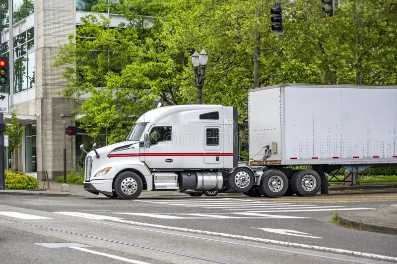 powerful-extended-cab-white-big-rig-semi-truck-transporting-cargo-dry-van-trailer-running-