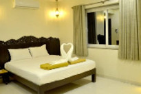 kamal-farm-resort-shahapur-bed-room_edited.jpg