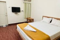 suvarna-shree-resort-bed-room_edited.jpg