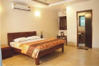 paradise-villas-and-resort-bed-room_edited.jpg