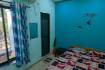 navdurg-beach-resort-room-bed-room_edited.jpg