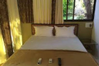 divine-farm-stay-bed-room_edited.jpg