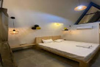 namaste-beach-resort-bed-room_edited.jpg