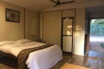 exotica-beach-resort-bed-room_edited.jpg