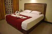teerth-raj-beach-resort-bed-room_edited.jpg