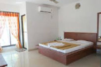 surali-wadi-beach-resort-bed-room_edited.jpg