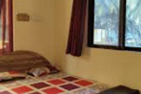 mauli-cottage-bed-room_edited.png