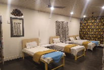 manoranjan-beach-resort-bed-room_edited.png