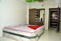 anandsagar-resort-bed-room_edited.jpg